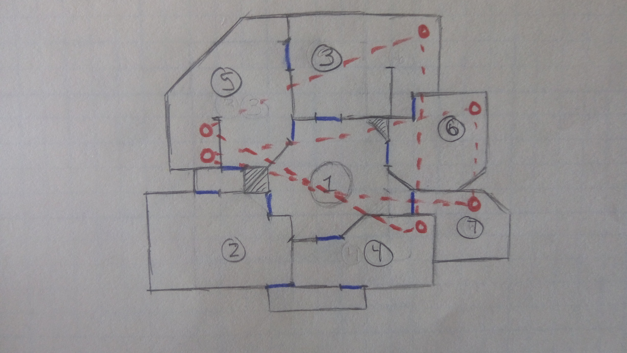 A hand drawn topdown level sketch on graph paper displaying a possible mall layout