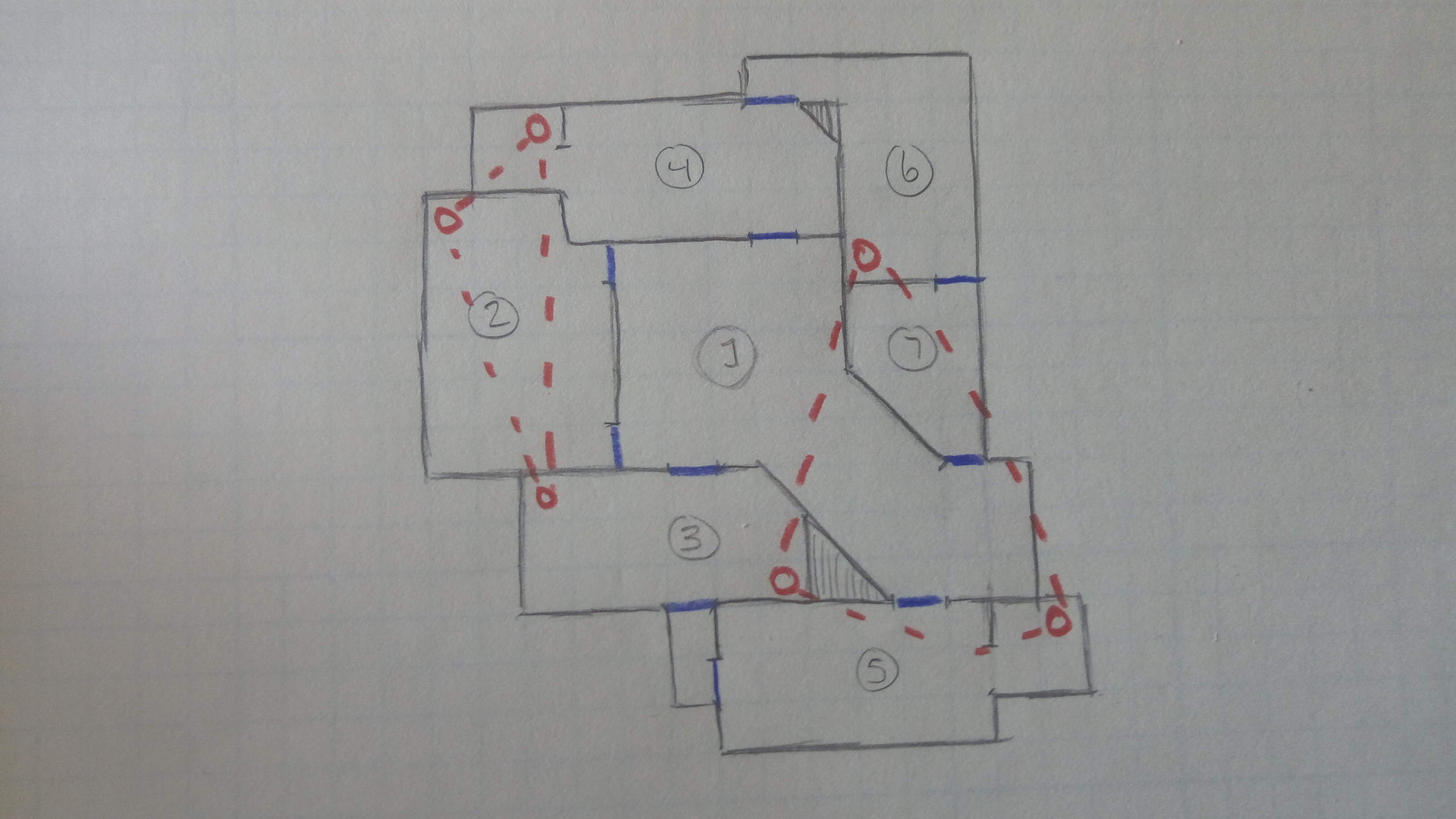 A hand drawn topdown level sketch on graph paper displaying a possible mall layout