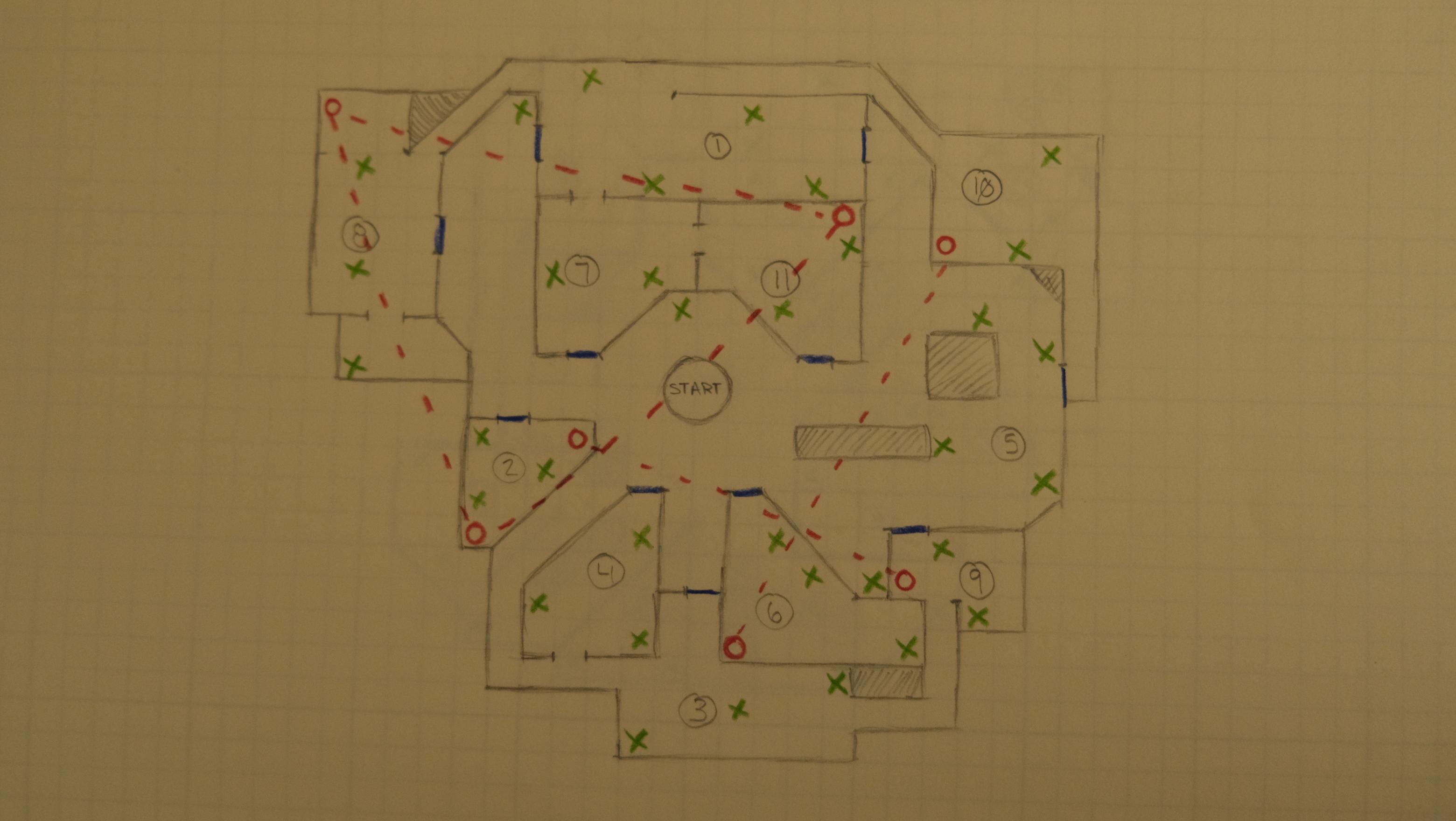 A hand drawn topdown level sketch on graph paper displaying a possible mall layout
