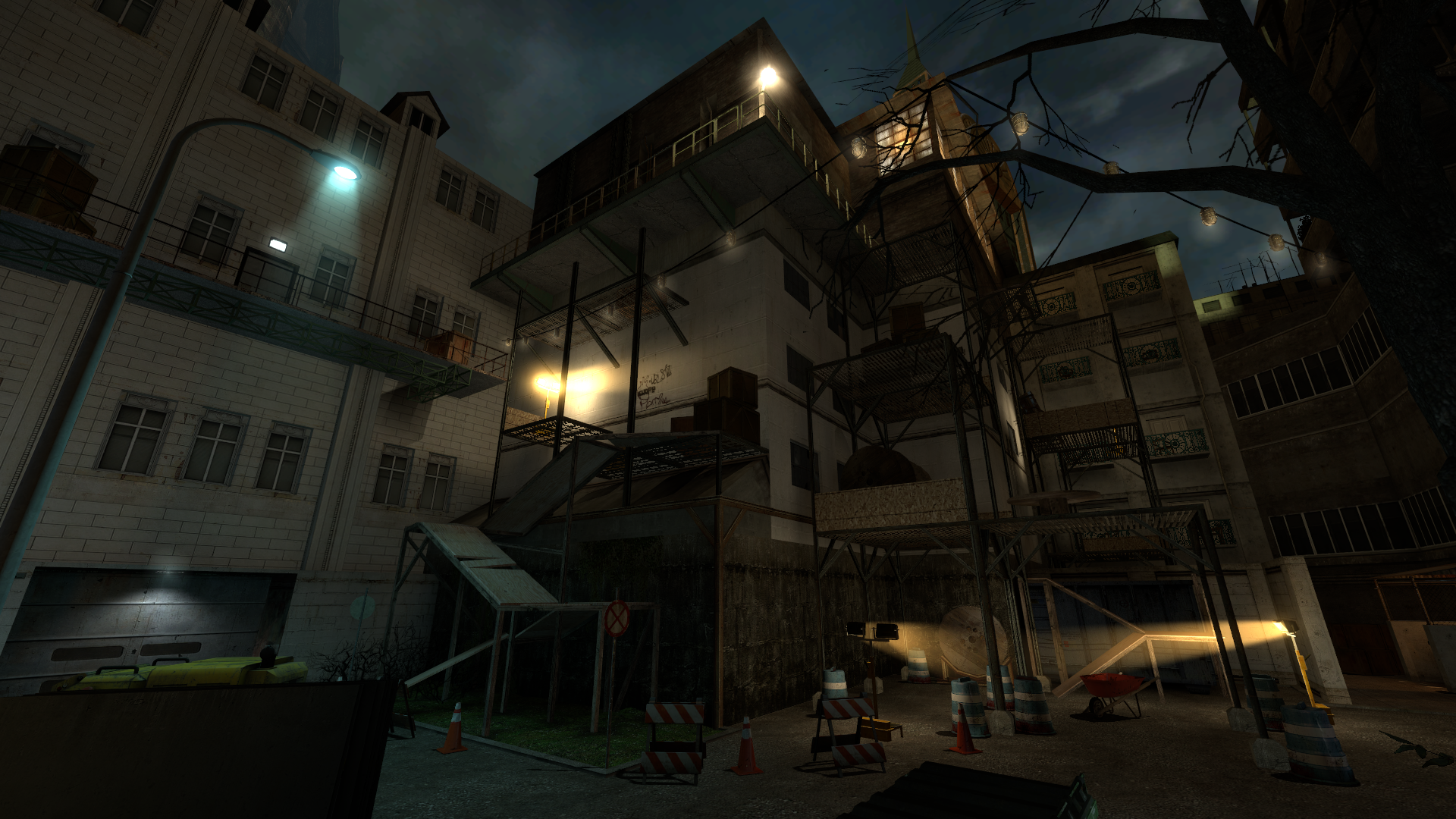 A Source engine screenshot of the Half Life 2 beta displaying a construction site at night with scaffolding, work lights, and caution markers