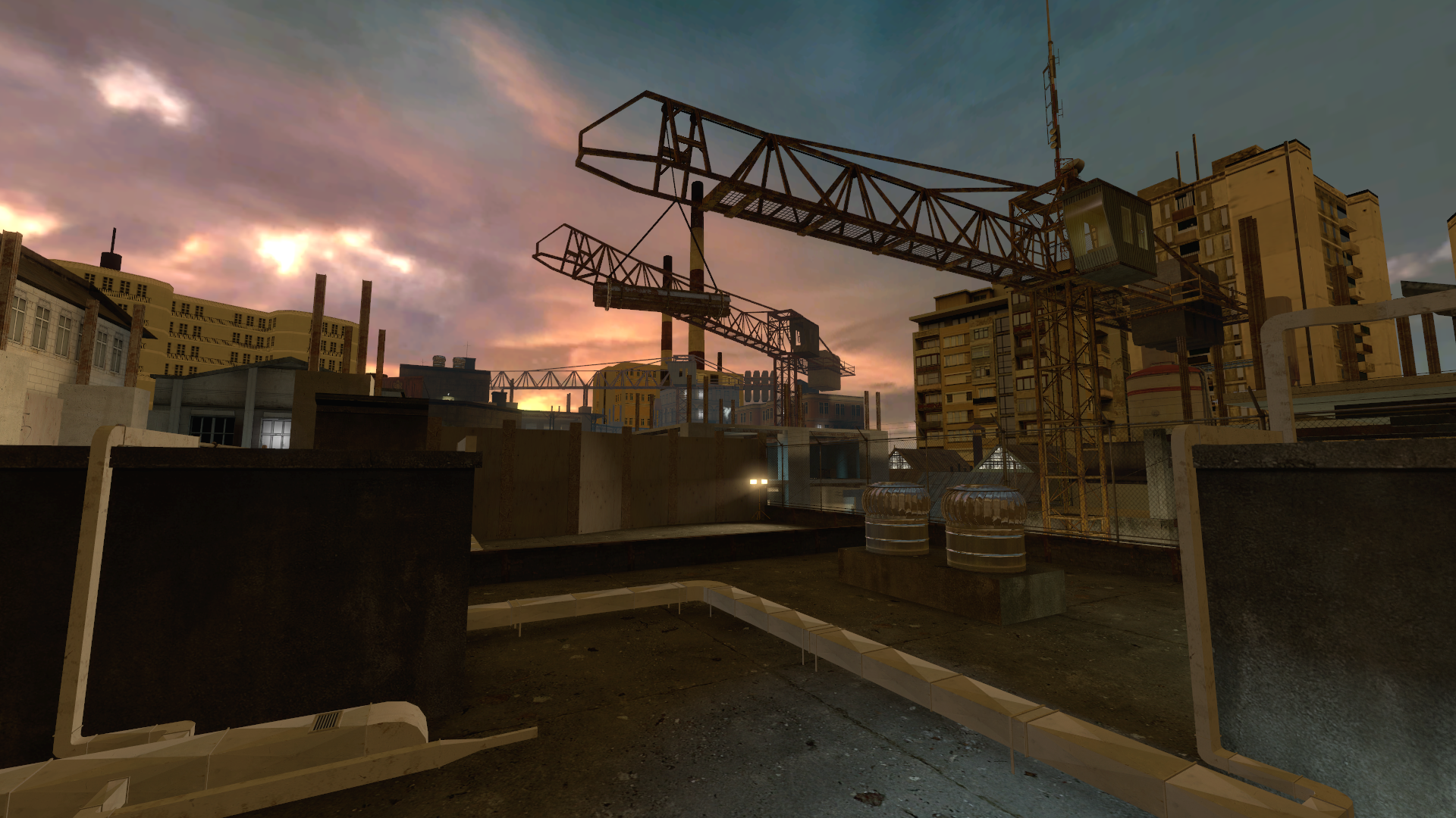 A Source engine screenshot of the Half Life 2 beta displaying rooftop with ventilation networks and distant cranes and construction equipment