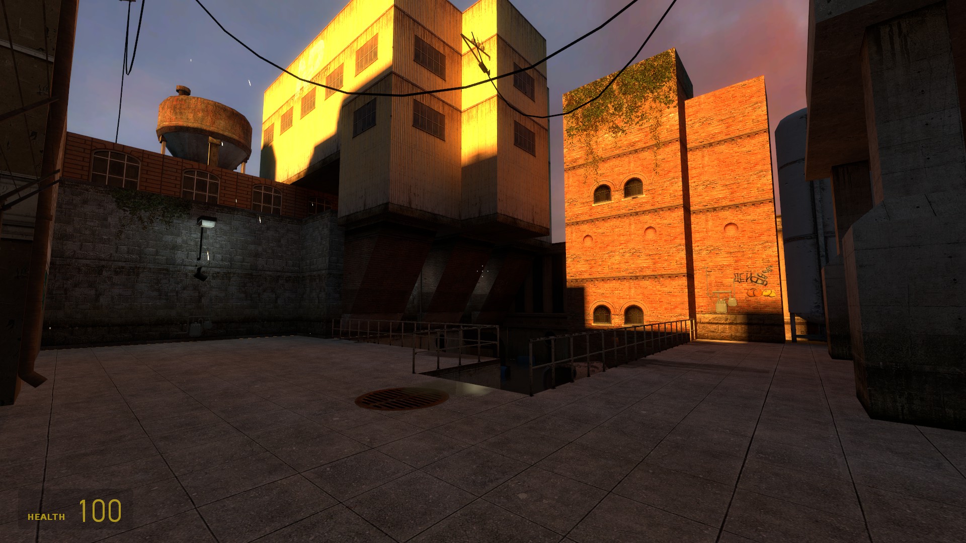 A Source Engine screenshot displaying an eastern european alleyway during the sunset complete with grafitti, wires, and shoddy construction