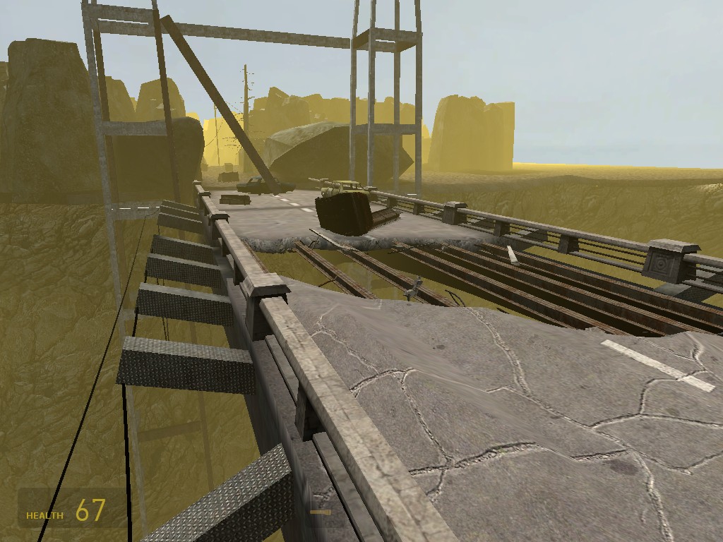 A Source Engine screenshot displaying a dilapidated bridge with destroyed cars and asfault falling through the bottom